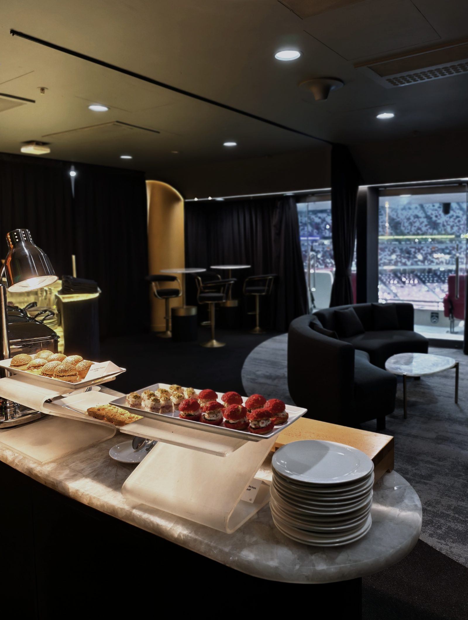 Premium F&B and catering spread inside the suite