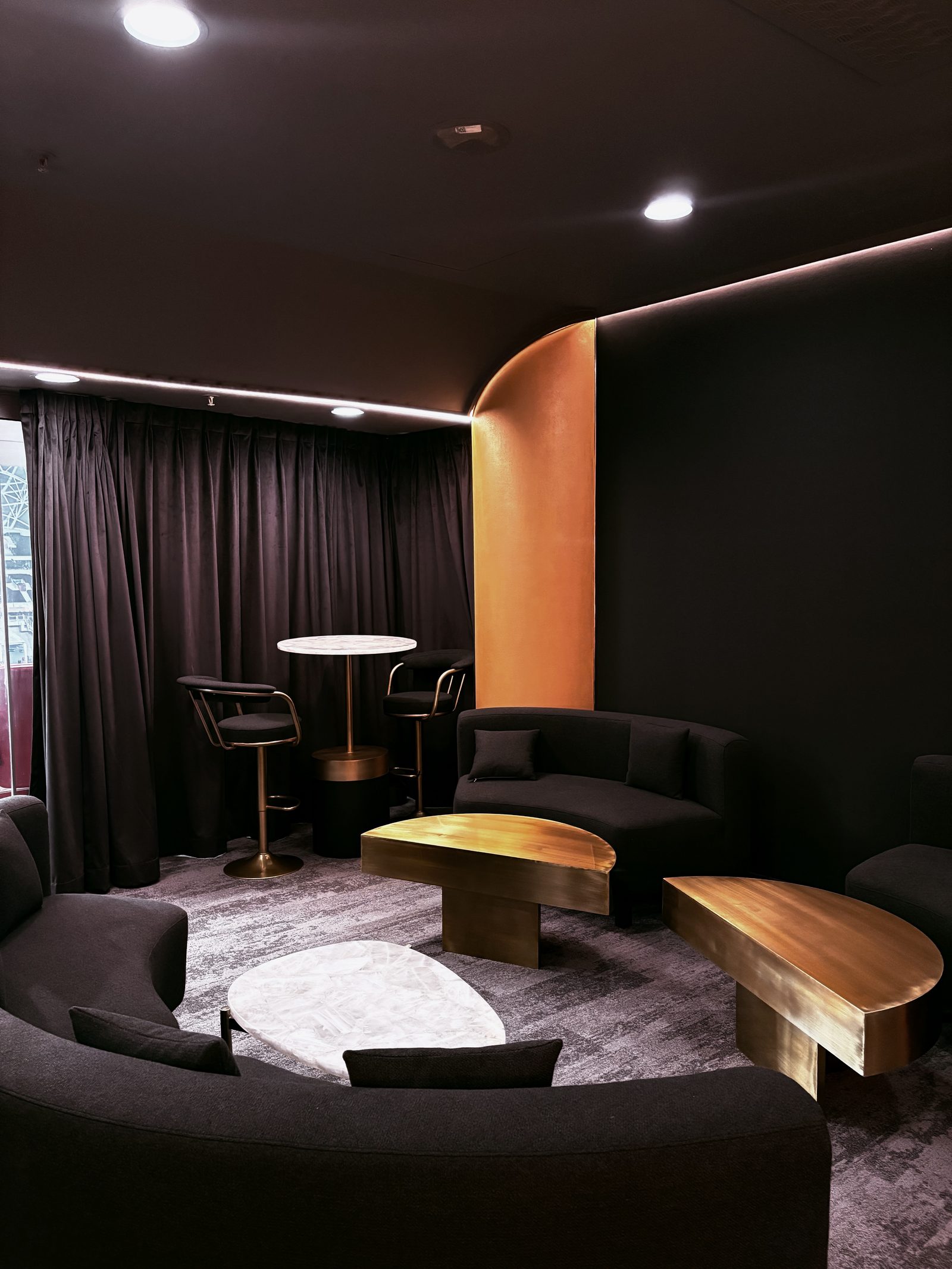 Amber Lounge suite - bespoke curved sofas and gold accents